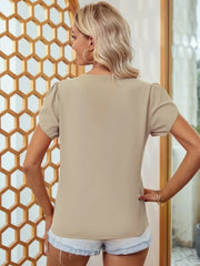 Khaki lace trim flutter sleeve blouse with a V-neckline and short sleeves.