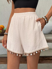 Apricot boyshorts with elastic waist and shell trim hem.