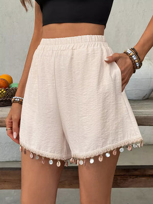 Apricot boyshorts with elastic waist and shell trim hem.