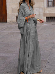 Elegant V-neck Maxi Dress With Flowy Sleeves in Black, close-up detail