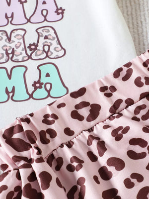 White cotton graphic tee with "Mama" text and pink leopard print shorts set.