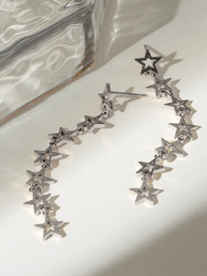 Silver celestial star dangle earrings with multiple stars cascading down.