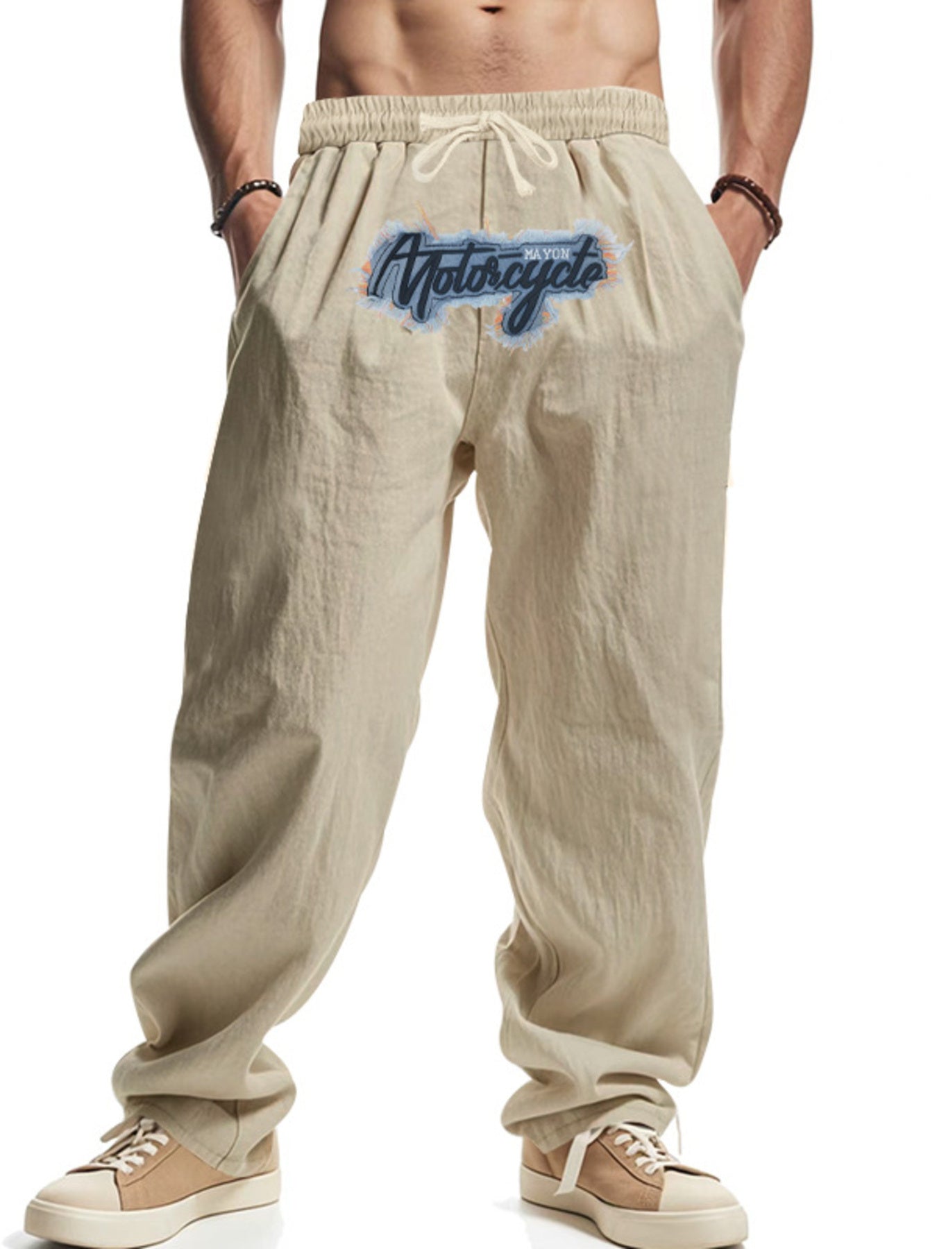 Khaki sweatpants with drawstring and motorcycle graphic detail