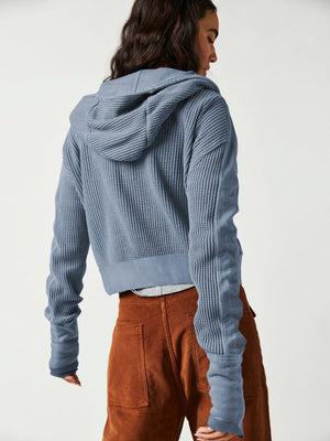 Dusty blue waffle knit cropped hoodie with long sleeves and a hood.
