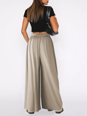 Drape-front wide-leg jersey trousers in Khaki with smocked waistband.