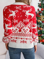 Red acrylic knit sweater with geometric reindeer and snowflake Fair Isle pattern.