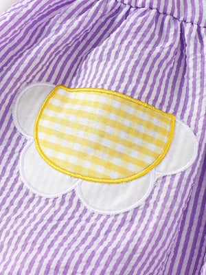 Children's purple and white striped seersucker top with a yellow gingham flower applique.