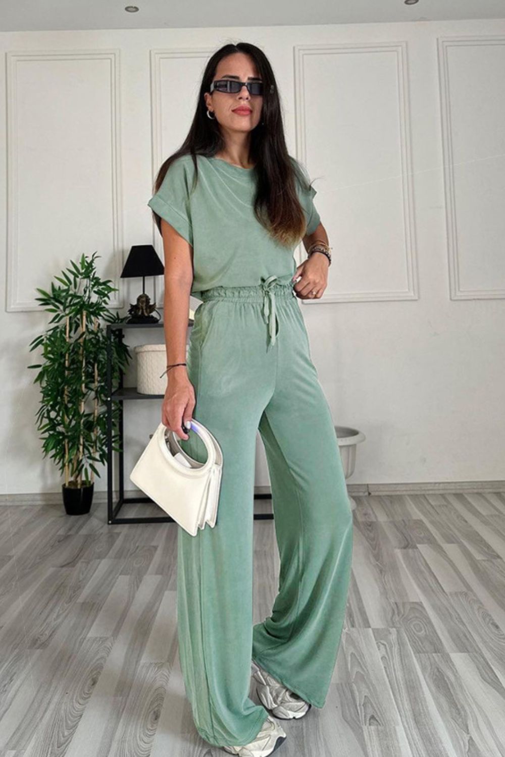 Relaxed fit tee and wide leg pants set in Gum Leaf green with drawstring waist.