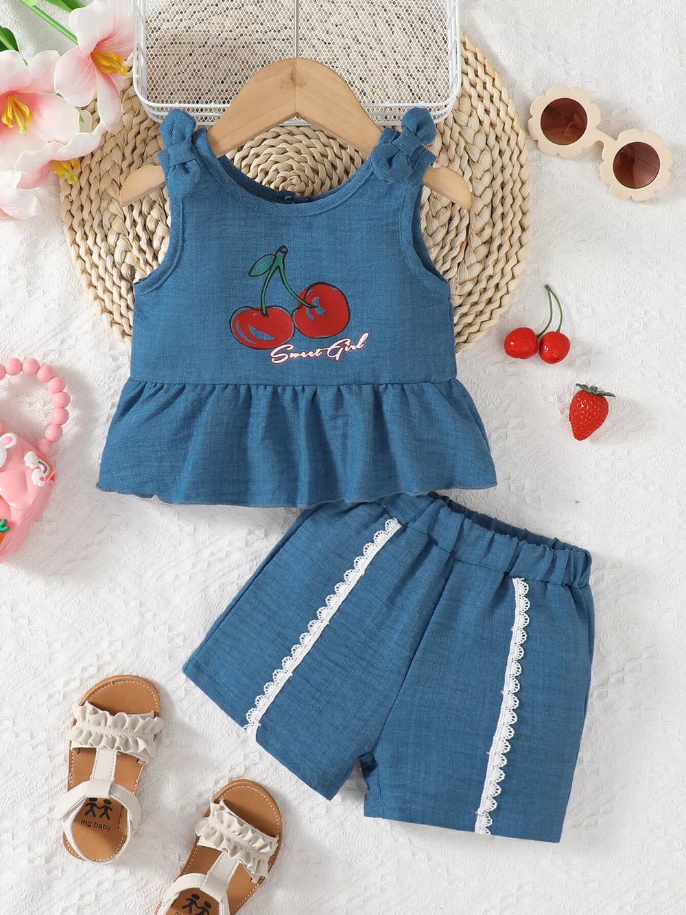 Blue peplum tank with cherry graphic and shorts set for baby girls.