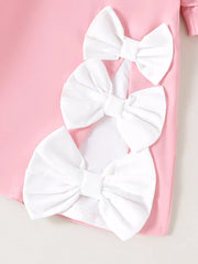 Children's Bow Puff Sleeve Dress in Pink, close-up detail
