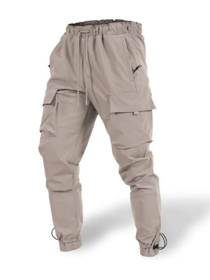 Tech-utility cargo joggers in mocha with drawstring waist and elastic cuffs.
