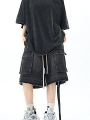 Black vintage cargo denim shorts with frayed hem and drawstring waist.