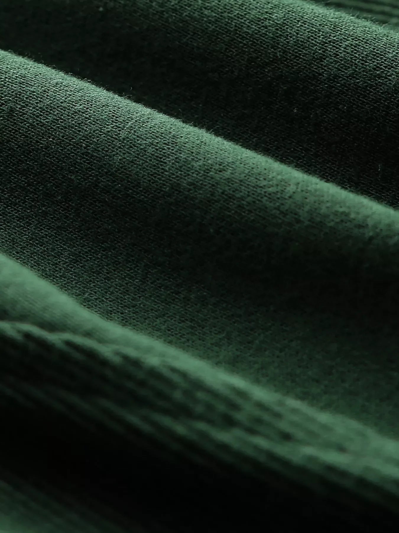 Dark green half zip stand collar sweatshirt fabric detail