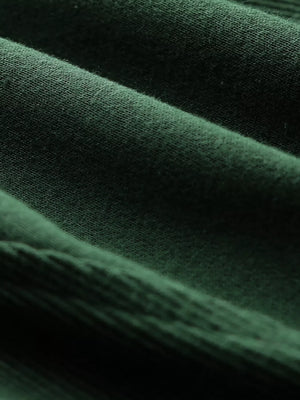 Dark green half zip stand collar sweatshirt fabric detail