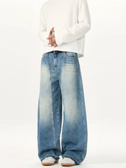 Relaxed fit washed cotton jeans in blue with a baggy cut and front seam detail.