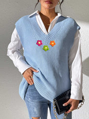 Light blue ribbed knit vest with embroidered flowers, V-neck, sleeveless, acrylic.