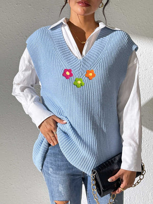 Light blue ribbed knit vest with embroidered flowers, V-neck, sleeveless, acrylic.