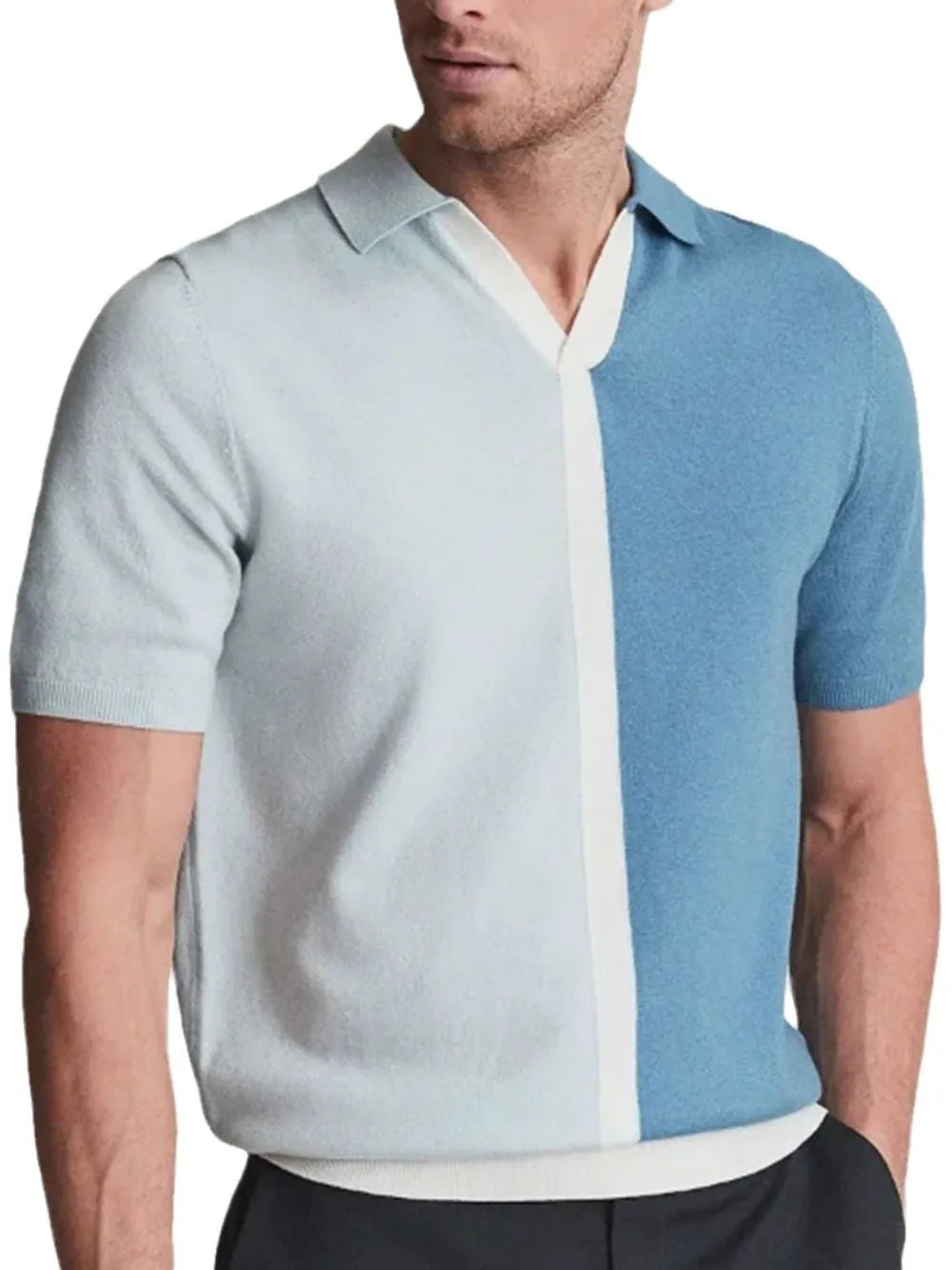 Colorblock knit polo shirt in cerulean with a contrast placket and collar.