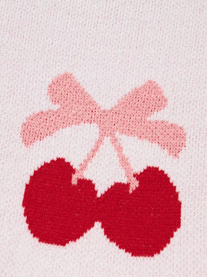Blush pink knit sweater with a red cherry and pink bow appliqué detail.