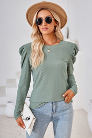 Light green textured puff-sleeve crew neck top with diamond pattern