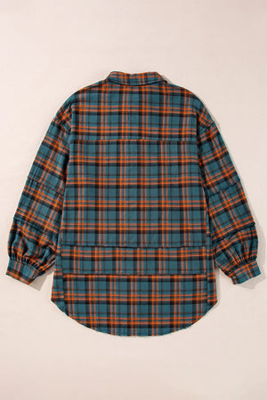 Oversized plaid overshirt in French blue with layered hem detail and cuffed sleeves.