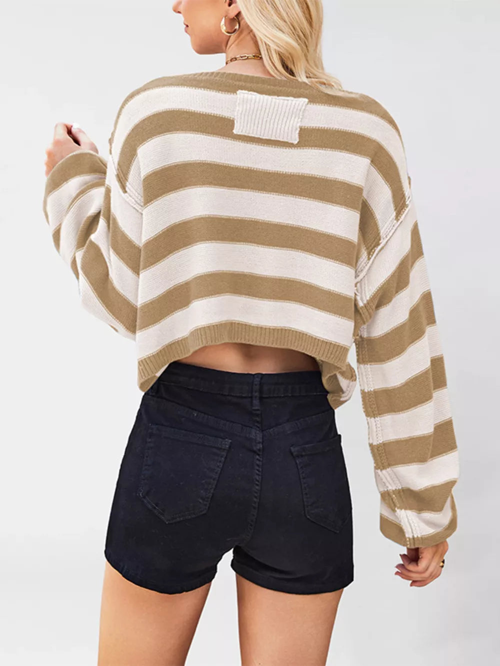 Khaki pullover sweater with exposed seam and long sleeve