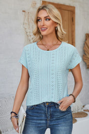 Light blue perforated eyelet cuffed tee with short sleeves and a round neckline.