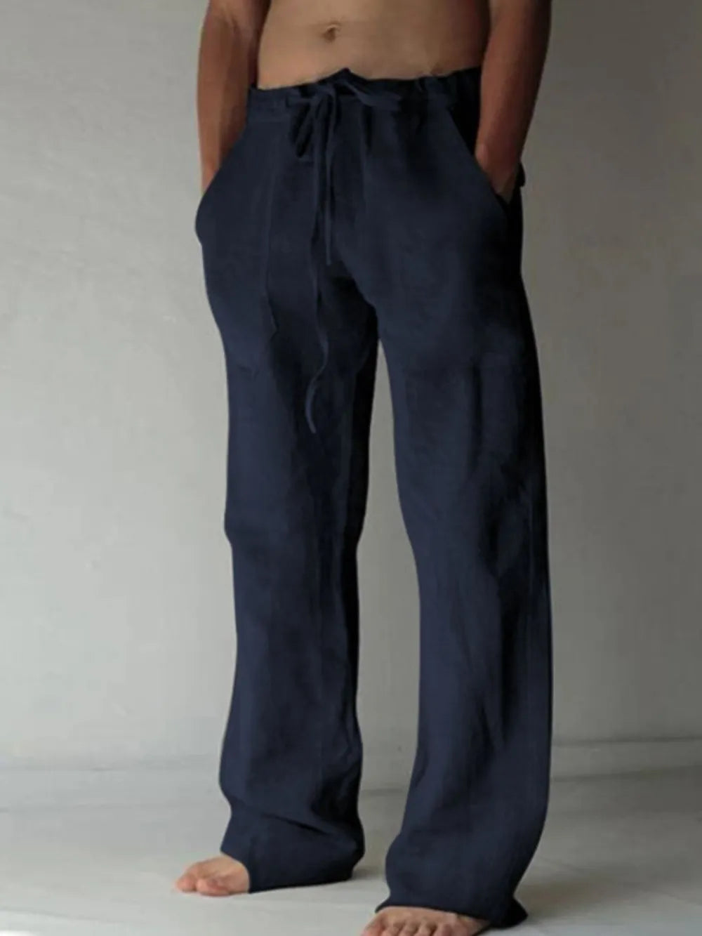 Navy linen blend wide-leg drawstring trousers with pockets.