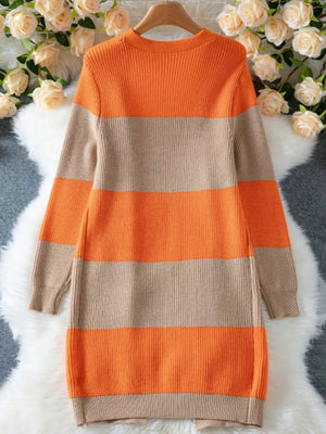 Color block knit cardigan with orange and beige horizontal stripes.