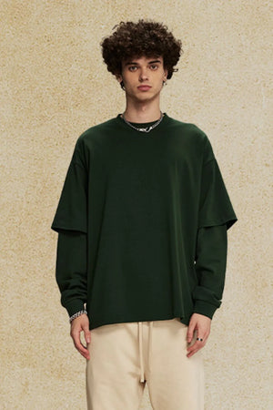 Layered sleeve oversized tee in dark green with crew neck and long sleeves.