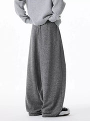 Relaxed fit ribbed knit sweatpants in dark gray with a drawstring waist.