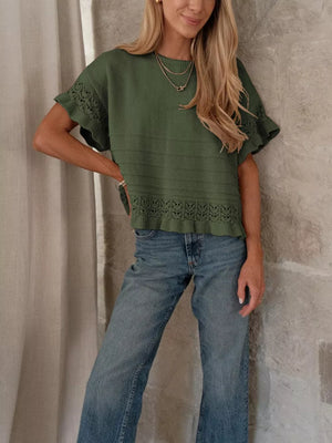 Army green knit top with crew neck and delicate lace trim on sleeves and hem.