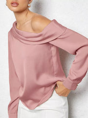 Elegant one-shoulder satin shirt in rose pink with draped neckline and button cuff.