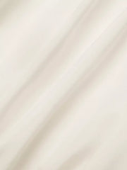 Gathered neckline peplum cami top in apricot, a casual tank with a defined waist.
