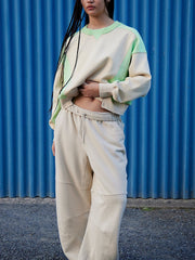 Chic Contrast Sleeve Sweater 3 in cream with gum leaf green contrast panels and crew neck.