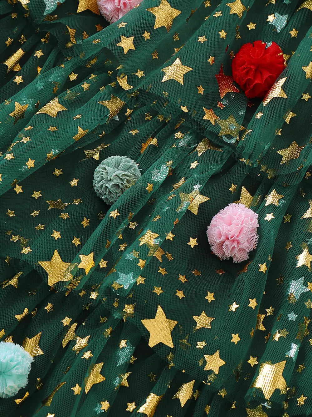 Green tulle baby dress with gold stars and colorful pom-poms