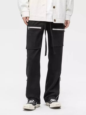 Black sweatpants with zipper pockets and drawstring waist.