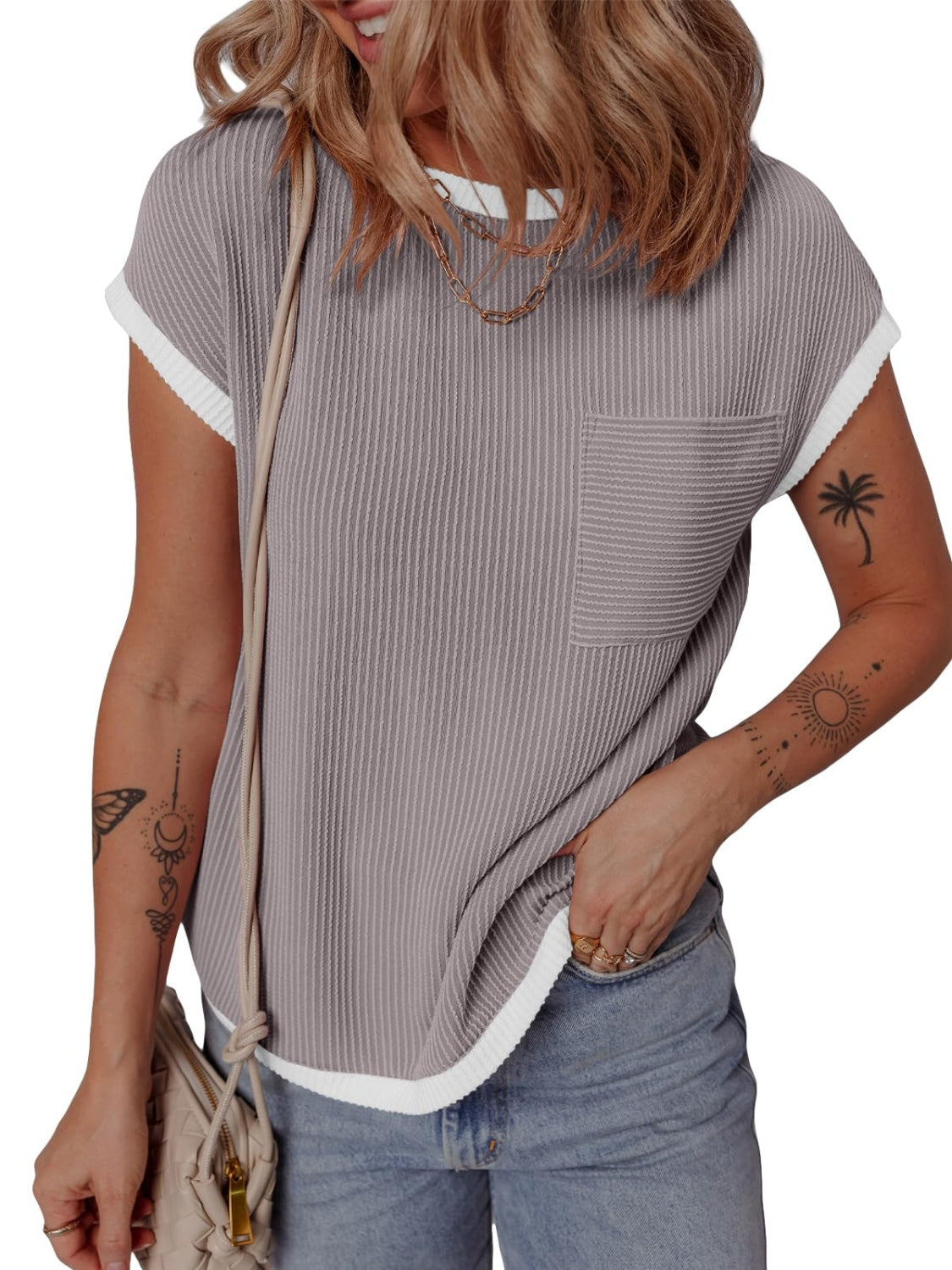 Ribbed knit tee in light gray with white contrast piping and a chest pocket.