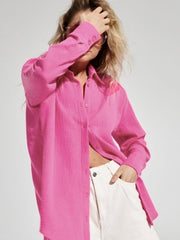 Textured cotton overshirt in hot pink with relaxed fit and button front.