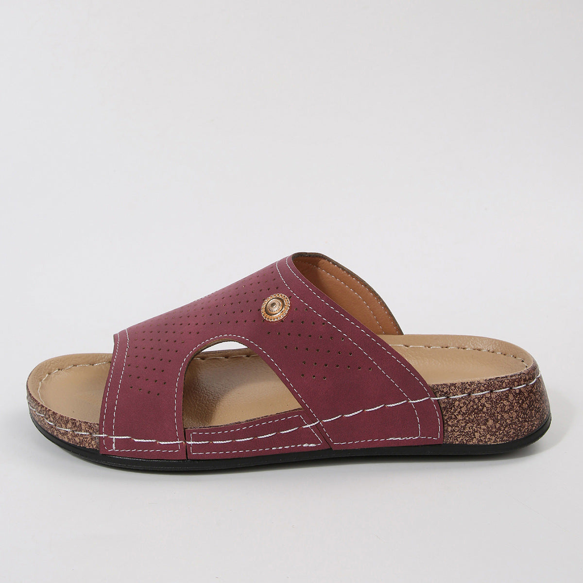 Burgundy perforated PU leather wedge sandals with white stitching and a decorative gold button detail.