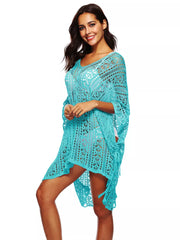 Pastel Blue crochet v-neck beach cover-up with cutout details and fringe hem.