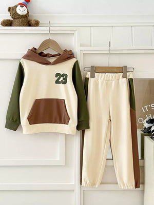 Baby color block hoodie and joggers set with green 23 graphic and brown accents.
