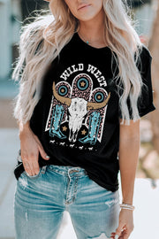 Black crewneck tee with Wild West graphic featuring bull skull and cowboy boots.