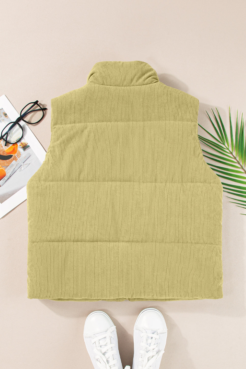 Corduroy padded collar vest in sage with horizontal quilting detail.