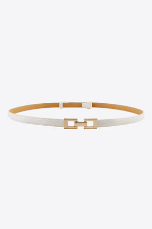 White leather belt with a gold geometric buckle detail
