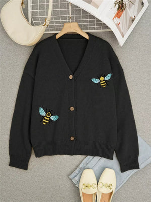 Black V-neck acrylic cardigan with embroidered bee detail and button-down front.
