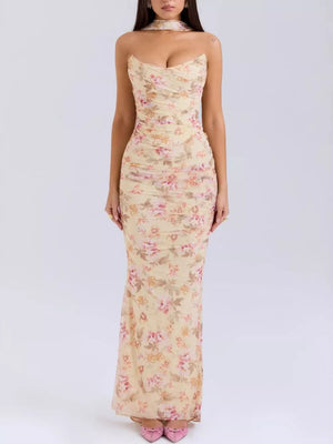 Yellow floral print sweetheart neckline ruched maxi dress with choker detail.