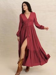 Burgundy maxi dress with balloon sleeves, V-neck, button front, and tiered hem.
