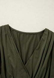 Army green draped bodice wrap bodysuit with V-neckline and pleated details.