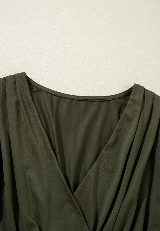 Army green draped bodice wrap bodysuit with V-neckline and pleated details.